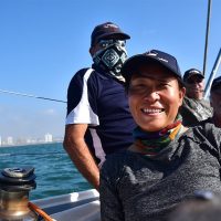 Crew Placement- A sunny day on the Indian Ocean and a crew of Offshore Sailing Academy students are Smiling at the Camera