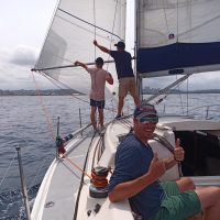 Yacht Crew- A sunny day on the Indian Ocean and a crew of Offshore Sailing Academy students are Smiling at the Camera